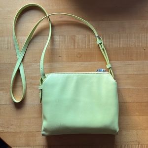 A new Day cross body in neon green/yellow